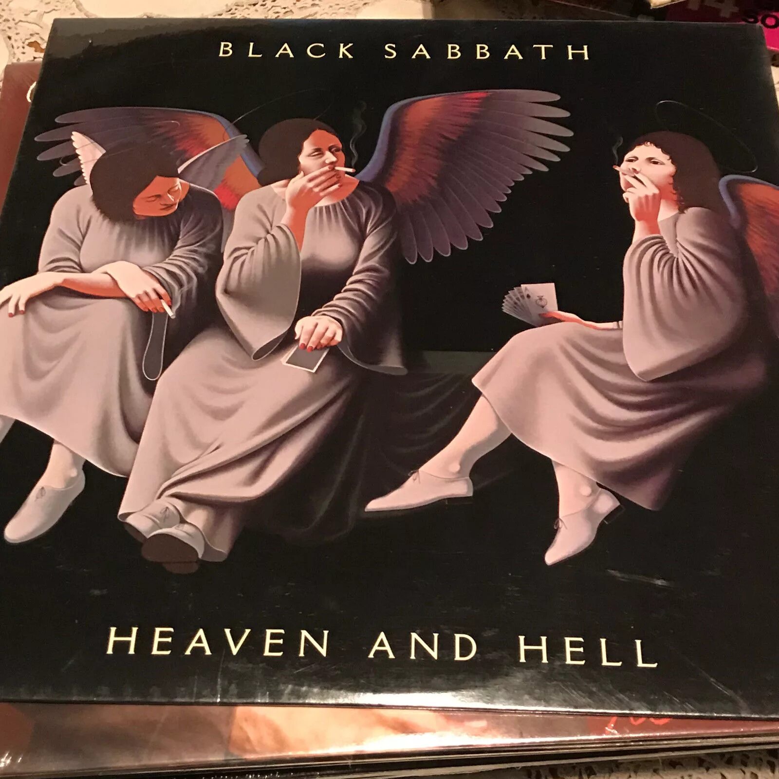 Black sabbath альбом heaven & hell. Black sabbath heaven and hell обложка. Black sabbath heaven and hell обложка. Heaven and hell. черный винил.