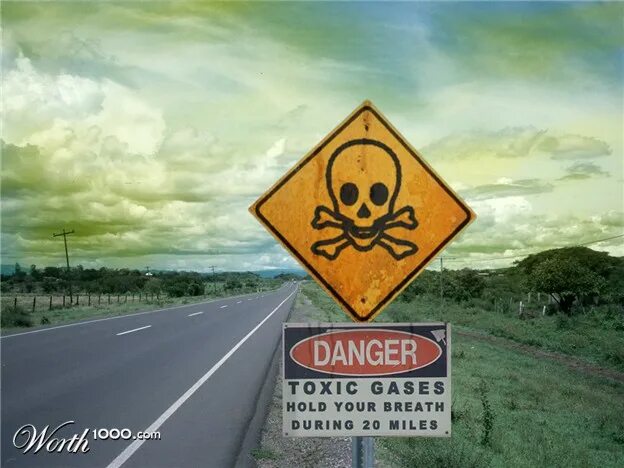 During 20. Scary signs. Toxic Gas. Danger Toxic Gases hold your Breath during 20 Miles. Scared sign.