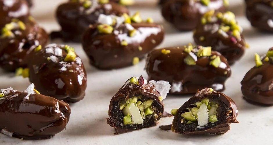 Chocolate dates. Chocolate dates with almond. dates with nuts. greek nut with surprise inside.