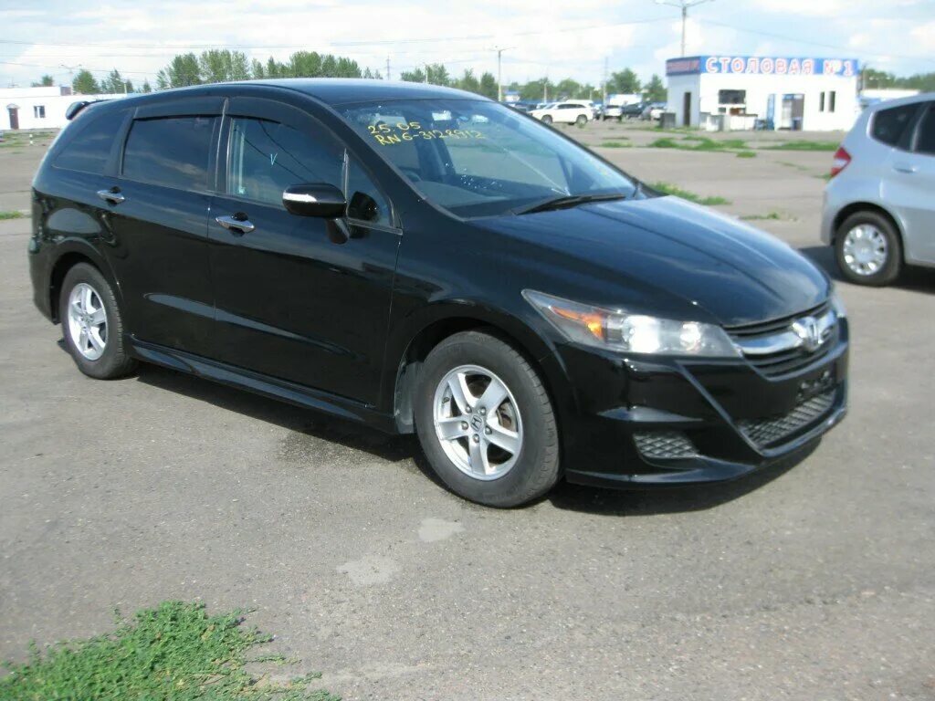 Купить хонда стрим в красноярском. Honda Stream 2010. Хонда стрим 2010 черный. Хонда стрим 2010 rsz. Хонда стрим 2 Рестайлинг.