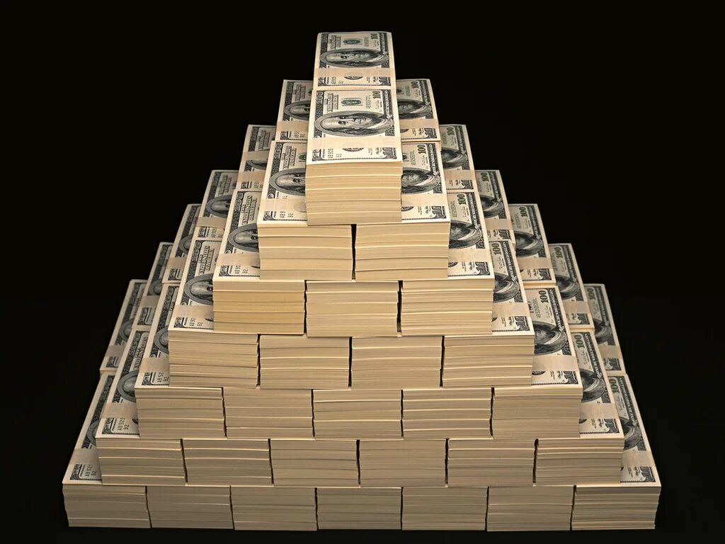 Миллион под. Гора денег. Большие деньги. Большие деньги пачками. Пирамида из пачек денег.