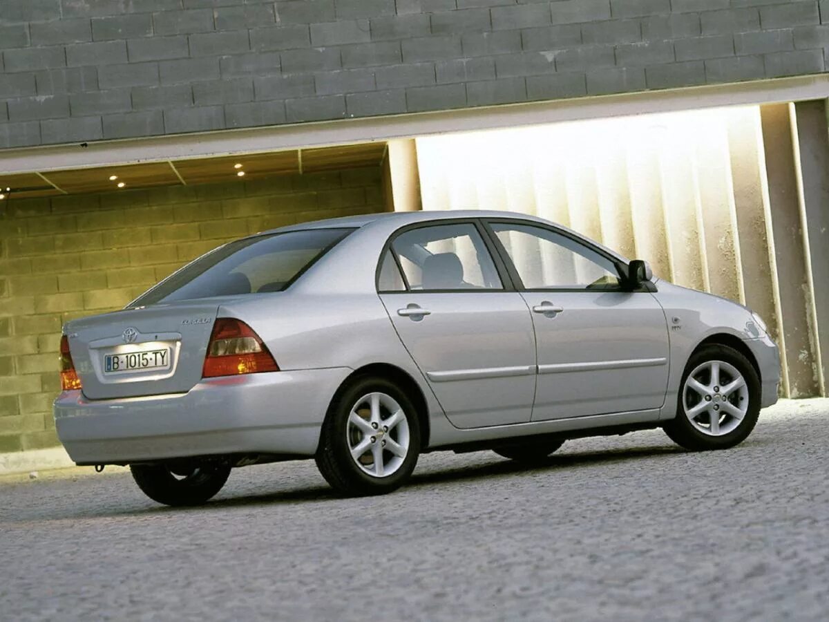 Тойота королла 9 поколения. Тойота Королла седан 2003. Toyota Corolla IX. Toyota Corolla 2001 седан. Toyota Corolla 9 поколение.