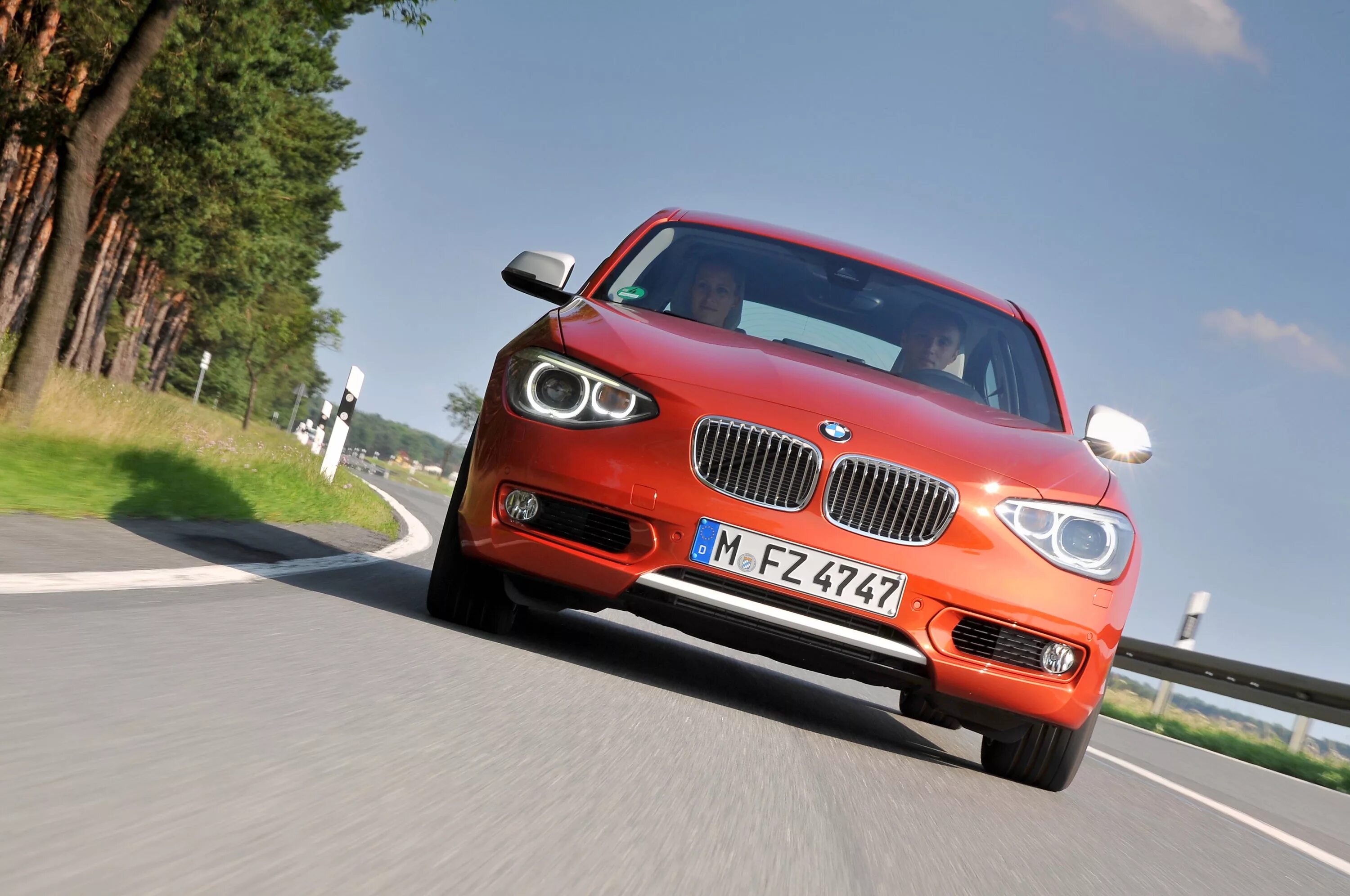 BMW 1 Series 2011. BMW serie 1 2011. БМВ 120d. BMW хэтчбек 1-Series.