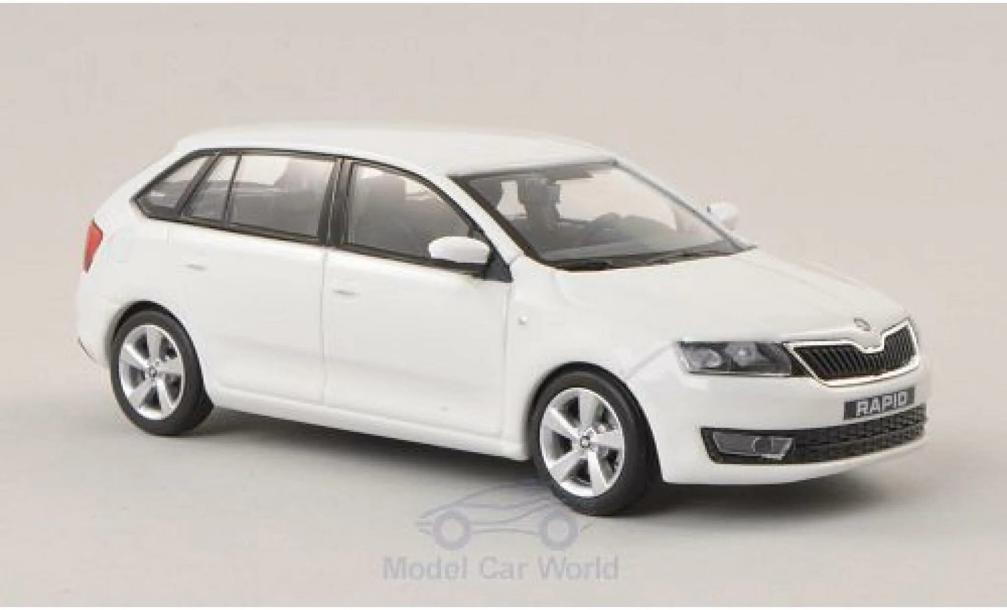 Rapid model. Модель шкода рапид 1 43. skoda rapid 1:43. skoda rapid 1 43 модель. 1:43 шкода рапид.