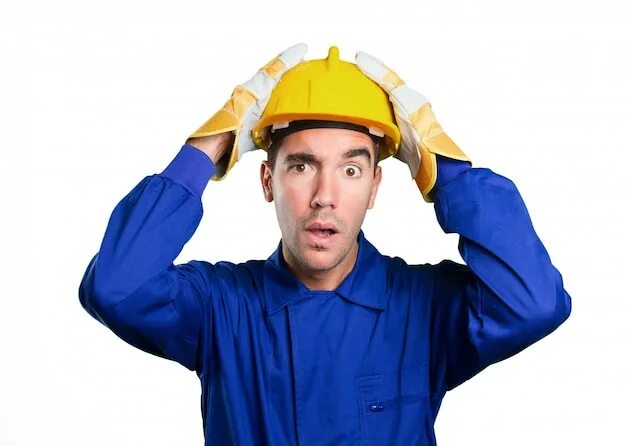 рабочий в каске. рабочий удивить. удивленный строитель. рабочий удивить. человек с ломом.
