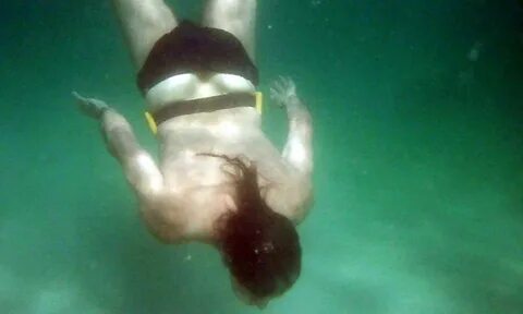 Underwater,swimming,man,breath holding,blowing bubbles - free i...