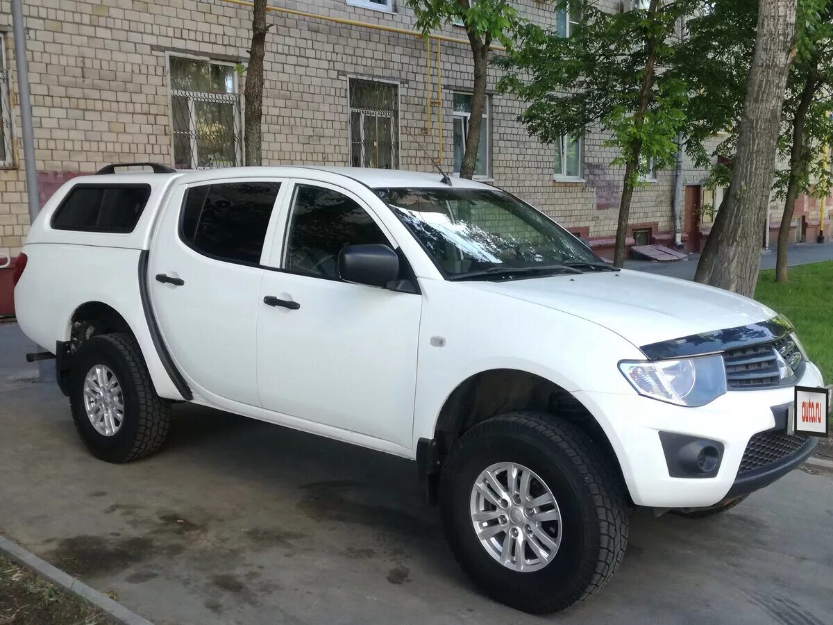 Mitsubishi l200 белый. Митсубиси l200 2012 года. Мицубиси л200 пикап белый механика. Mitsubishi l200 IV, 2012.