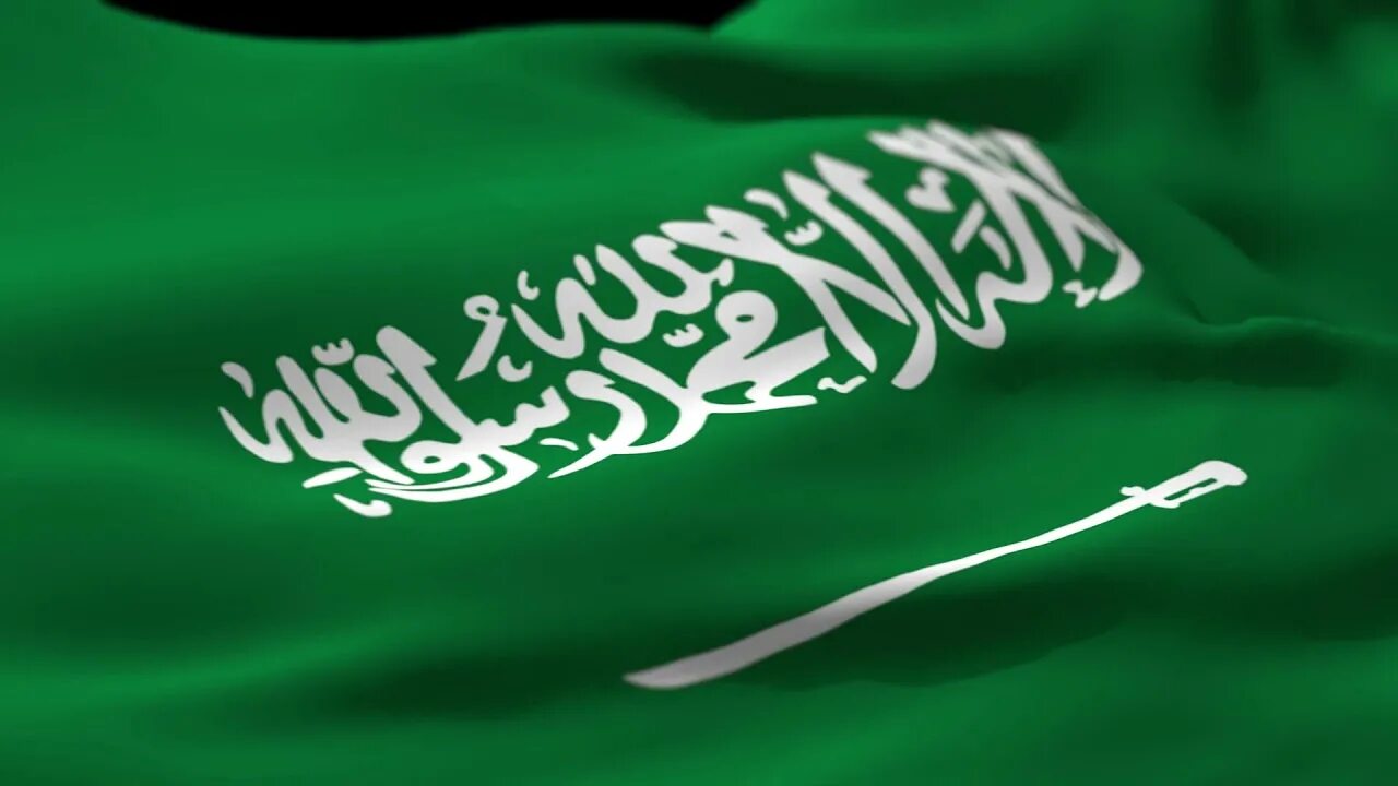 Саудовская аравия перевод. Саудия Аравия флаг. Флаг Саудовской Аравии на флагштоке. Шахада на флаге Саудовской Аравии. Флаг Саудовской Аравии 2022.