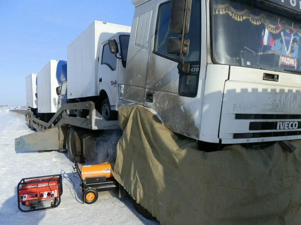 отогрев спецтехники jcb. отогревание грузового автомобиля тепловой пушкой. отогрев фуры. отогрев грузовых. отогрев экскаватора 800.