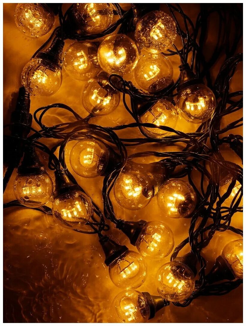 уличная гирлянда из лампочек. советская гирлянда. каждая лампочка елочной гирлянды. 719246. каждая лампочка елочной гирлянды.