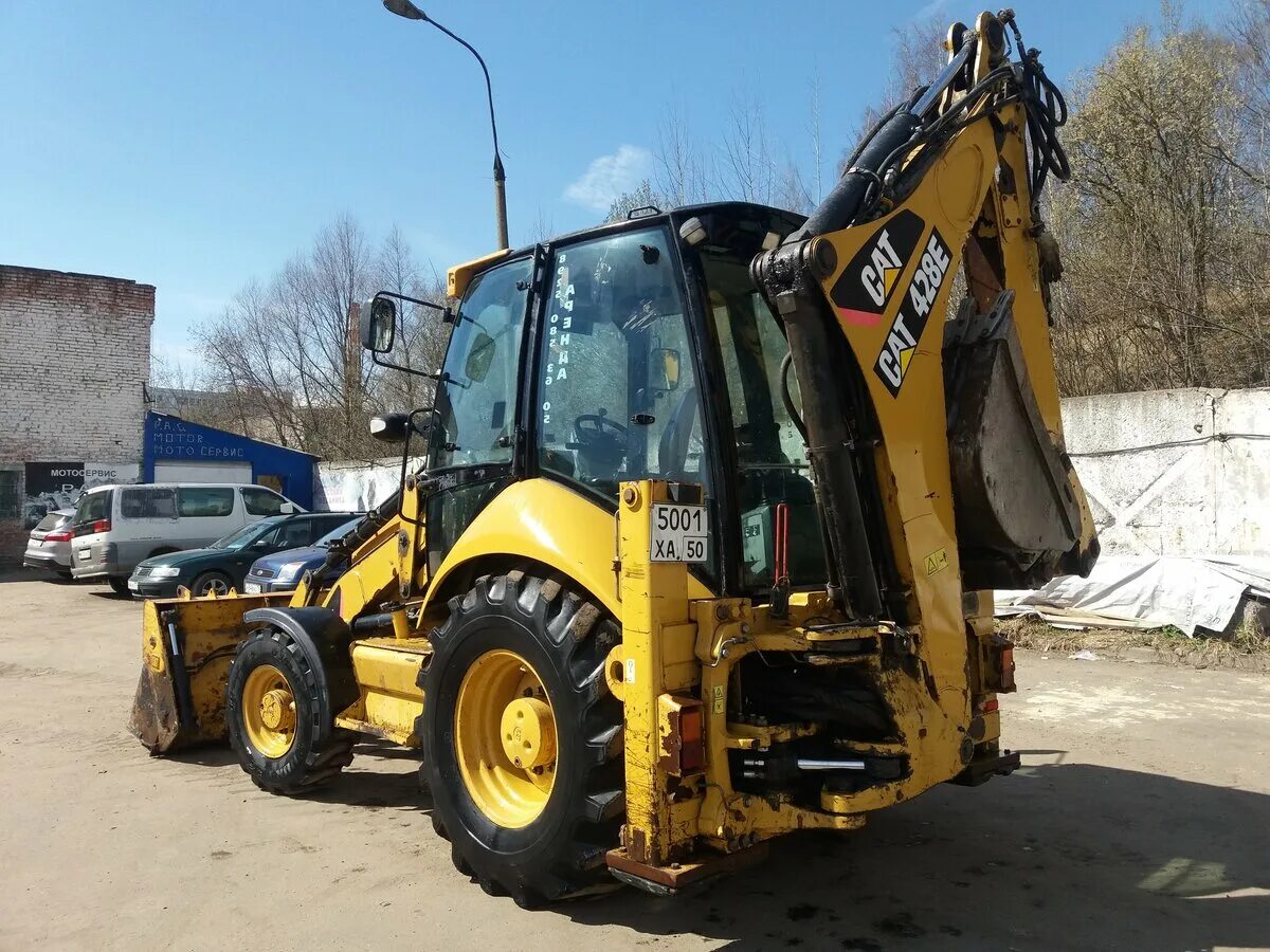 Экскаватор 428. Экскаватор-погрузчик Caterpillar 428e. Экскаватор погрузчик Катерпиллер 428е. Экскаватор погрузчик Cat 428e. Катерпиллер экскаватор погрузчик 428.