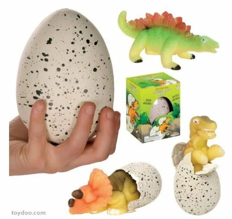 Яйцо с игрушкой купить. Dinosaur Egg игрушка. Яйцо динозавра Дино Тойс. Динозавр в яйце игрушка вылупляется. Игрушка яйцо динозавра растущее в воде.