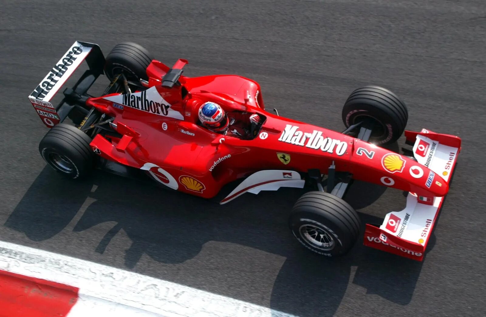 Болид f1 Ferrari 2002. Ferrari f2002. Ferrari f2002 Schumacher. Ferrari f2002 Михаэль Шумахер 2002.