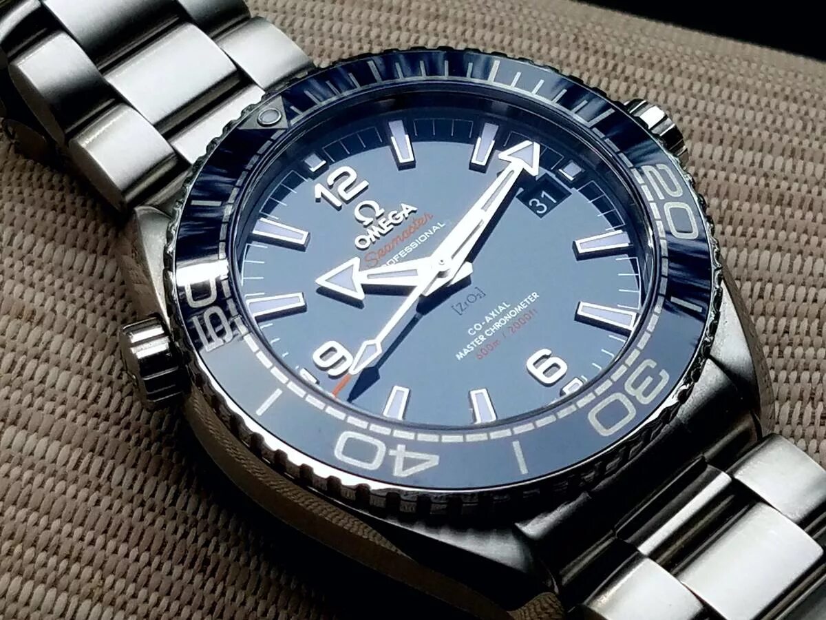 Магазин часов омега. Omega Planet Ocean 600m. Часы Omega w7579. Omega Planet Ocean 43.5. Omega a821 часы.