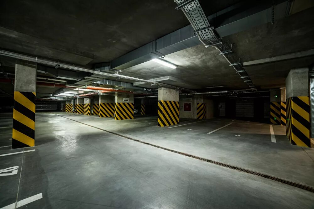 Подземный гараж. Подземный паркинг. Наземно-подземные парковки. Подземный гараж в частном доме.