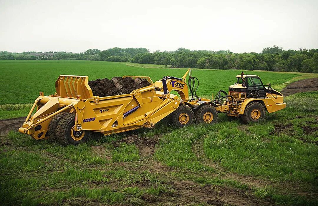 T me ccs scraper. Прицепной скрепер k-Tec. Прицепной скрепер SCR 260s. Скрепер Caterpillar ts225. Скрепер полуприцепной Caterpillar 876.