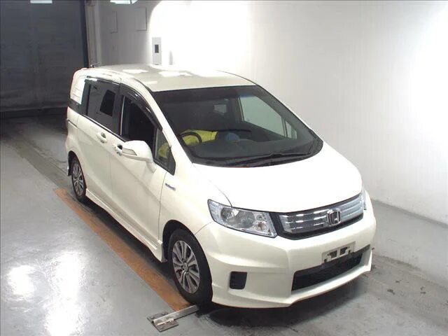 Под заказ авто из японии во владивостоке. Honda freed Spike 2011. Honda Spike freed кастом. Авто из Японии с аукциона. Кроссовер из Японии с аукциона.