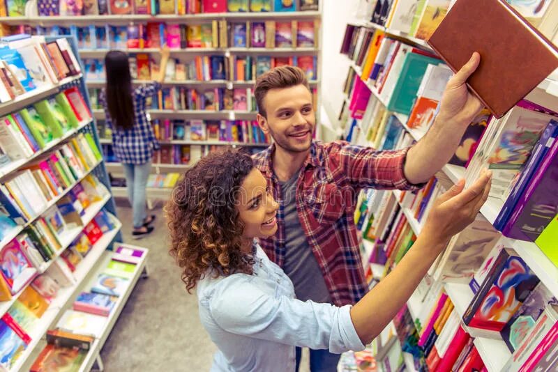 At the Bookshop. Молодой человек покупает книгу. About book shop. Книга my shop