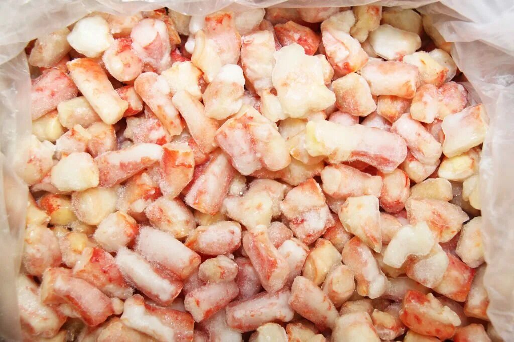 Варено мороженого краба. Мясо краба. колено камчатского краба. мясо камчатского краба. крабовое мясо замороженное.