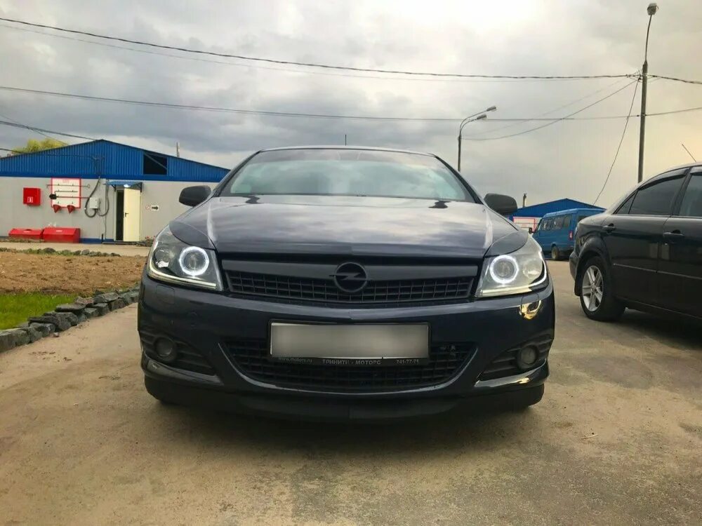 Оптика Opel Astra h GTC. Фары Opel Astra h Eagle Eyes.