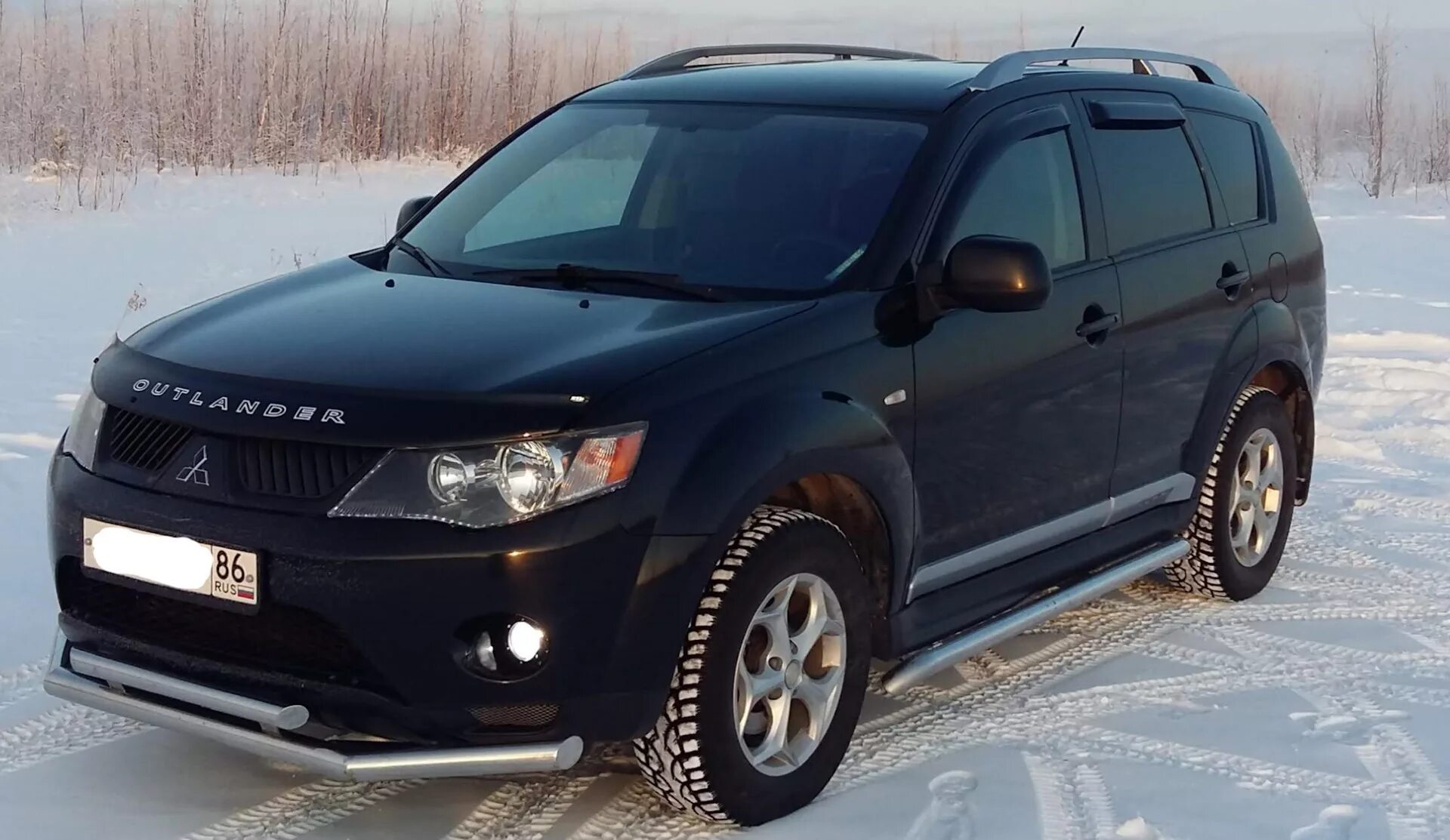 Мицубиси хл 2008. Mitsubishi Outlander XL 2.4 2008. Аутлендер XL 2008. Митсубиси Аутлендер XL 2008. Аутлендер 2007 2.4.