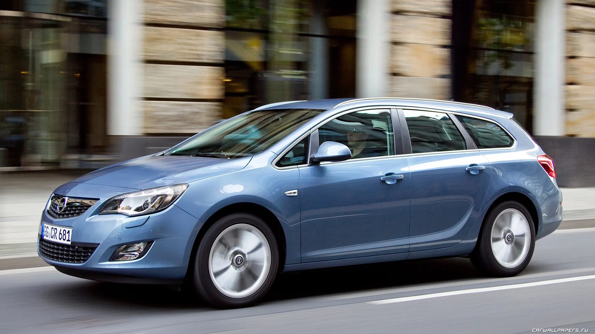 Opel Astra универсал 2011. Opel Astra Sports Tourer 2011. Opel Astra 2010 универсал.