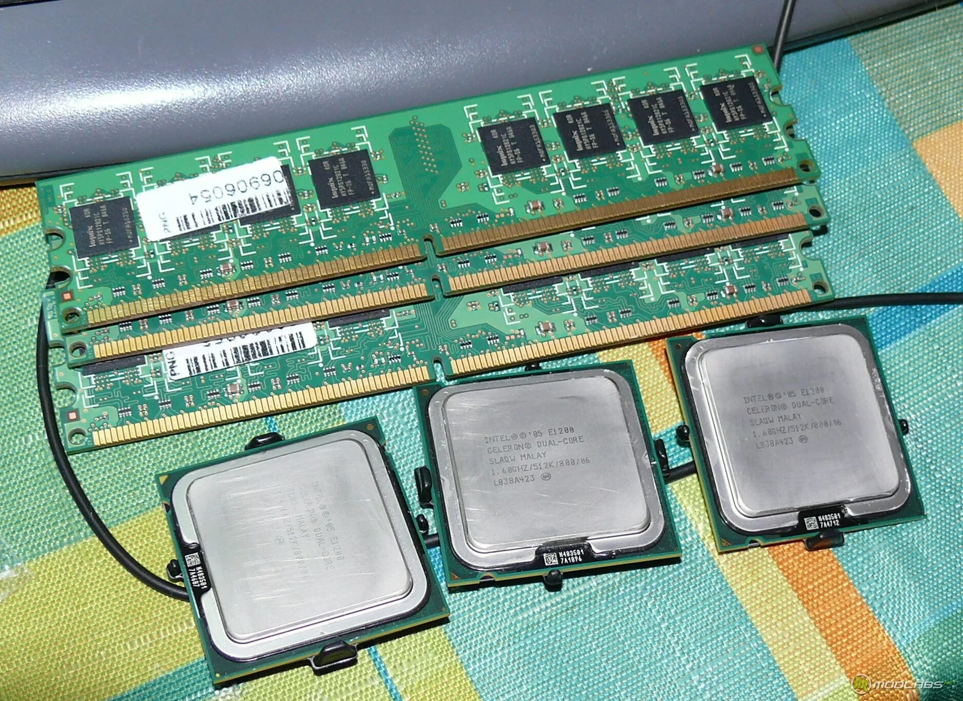 Socket 370 pentium. Intel celeron 1200mhz. Процессор сокет 370 400 мгц. Olencom e1200. Процессор celeron e1200.