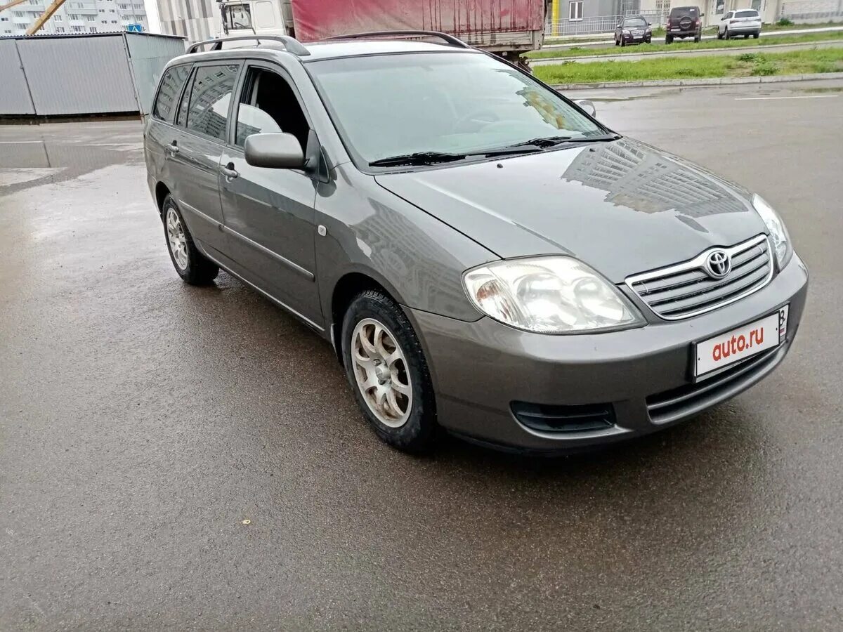 Куплю тойота королла 2004. Toyota Corolla 2004 универсал. Тойота Королла универсал 2004. Тойота универсал 2004. Toyota Corolla IX 2004г Рестайлинг.