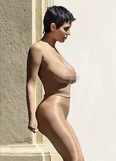 Kanye West's wife Bianca Censori covers chest as she slips into skinti...