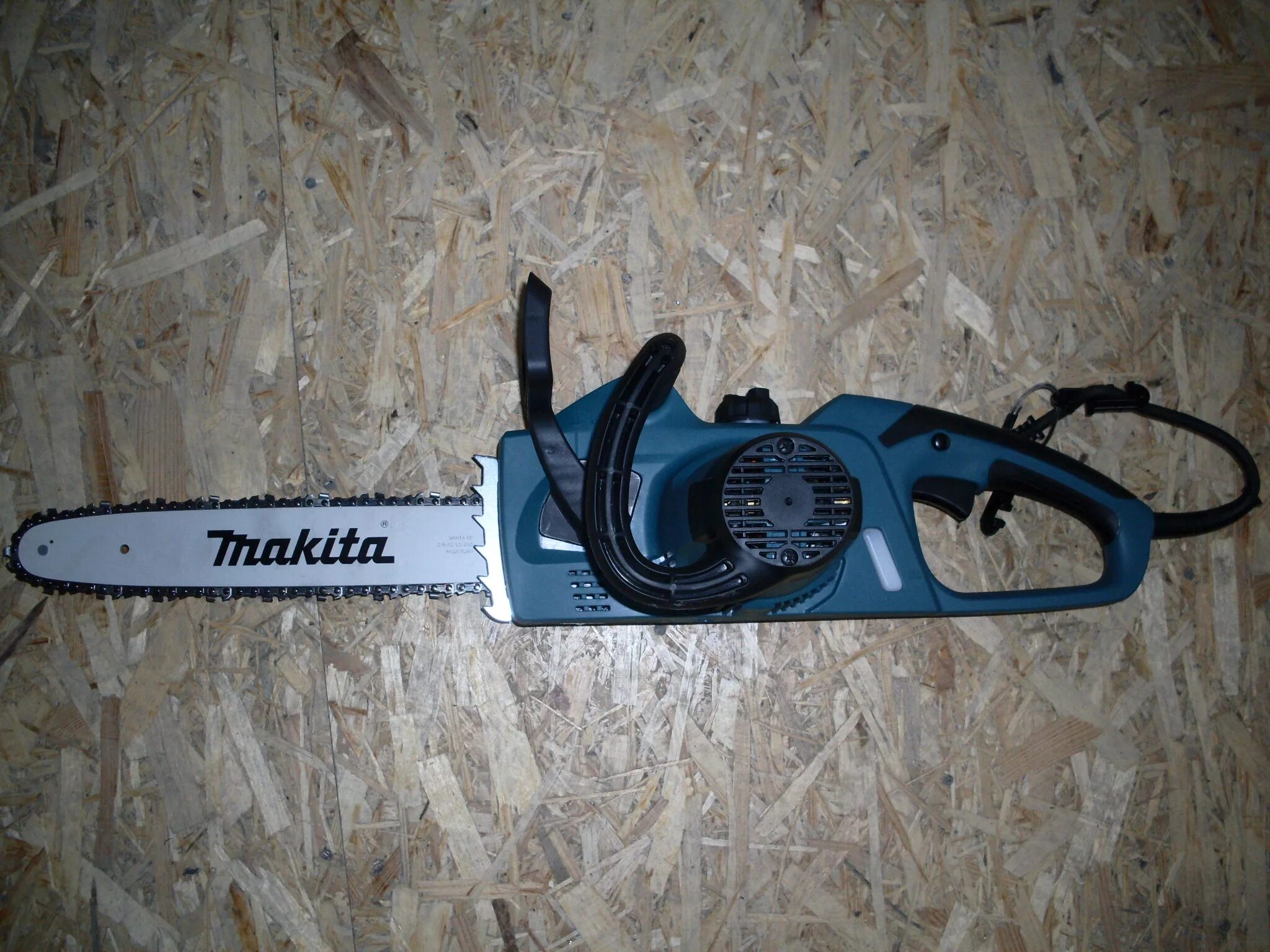 Makita uc3541a. Электропила Макита 3541а. Электропила Макита uc35. Цепная электрическая пила Makita uc3541a.