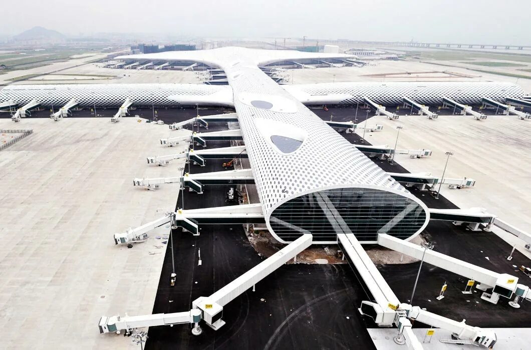 Какой самой большой аэропорт в мире. Баоань аэропорт. Аэропорт Кансай терминал. Шэньчжэнь Баоань. Шэньчжэнь аэропорт.