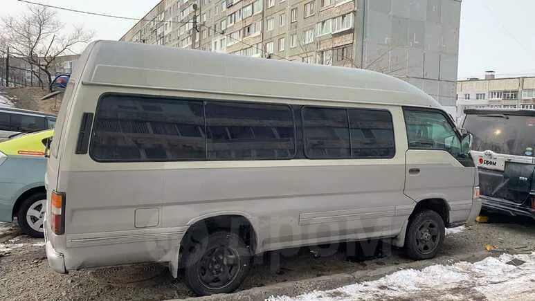 Ниссан Караван 97 года. Nissan Caravan 2.7d coach long DX.