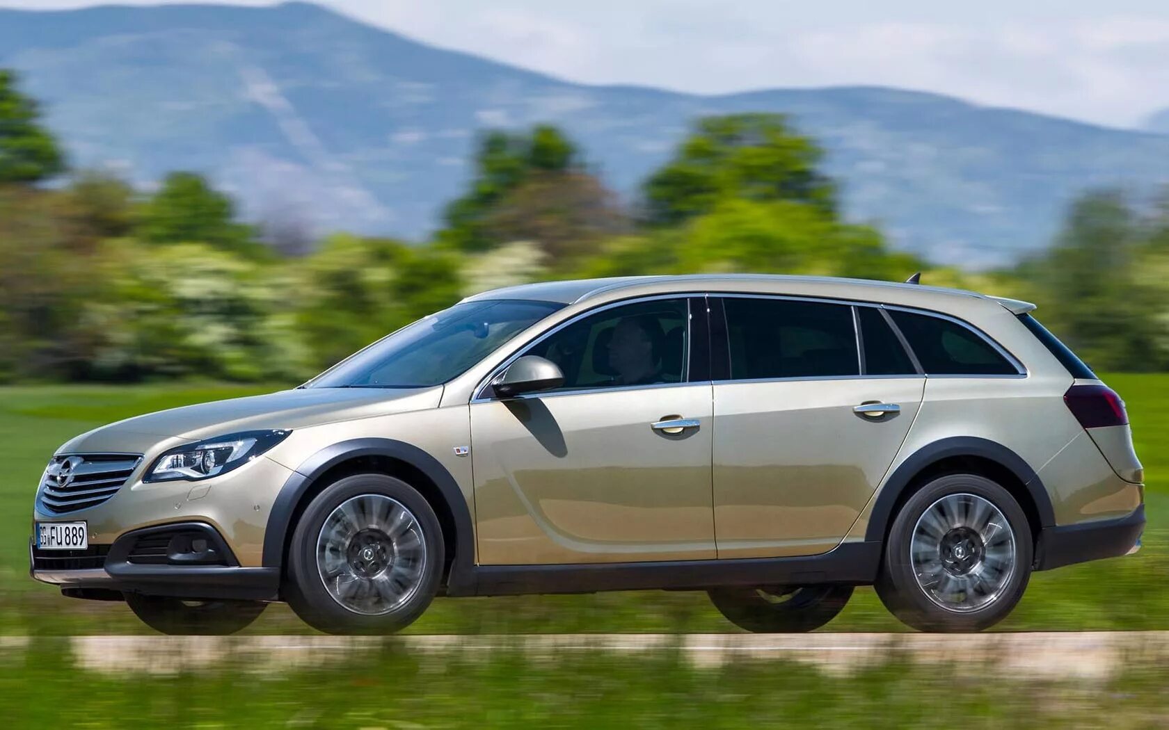 Country touring. Opel Insignia Country Tourer. Опель Инсигния универсал 2014. Опель Инсигния Кантри Турер 2015. Опель Инсигния Кантри Турер 2014.