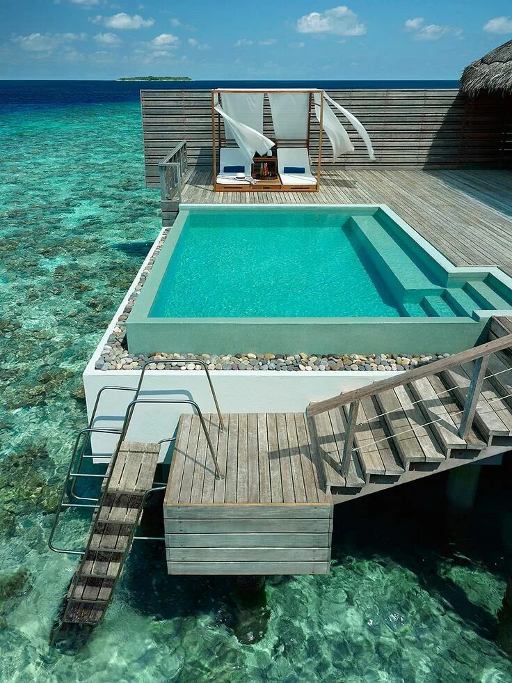 Amazing around. Мальдивы Dusit Thani Maldives. Dusit Thani Maldives 5 Мальдивы. Атолл Баа. Вилла на воде.