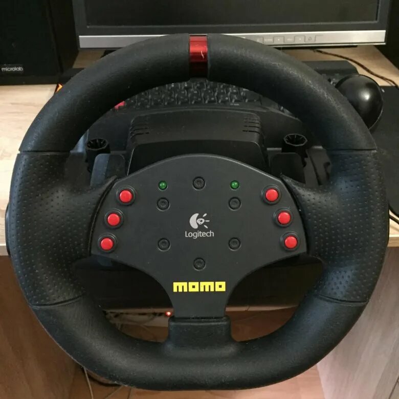 Руль момо рейсинг. Logitech Momo Racing. Игровой руль Logitech Momo Racing. Игровой руль Лоджитек МОМО. Руль Лоджитек МОМО Racing.