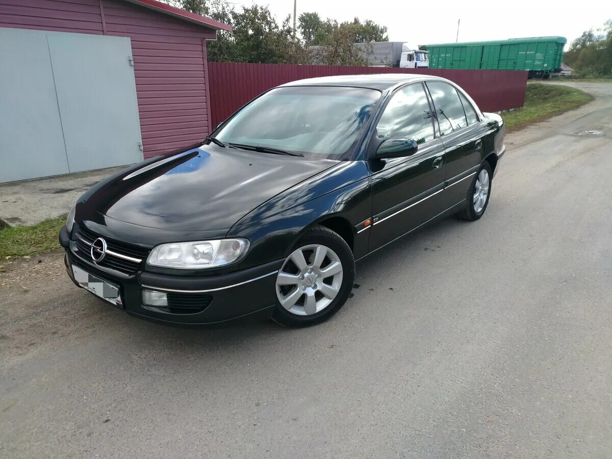 Купить опель 1997. Opel Omega b 1997. Opel Omega 1997. Опель Омега седан 1997. Опель Омега 1997 2.0.