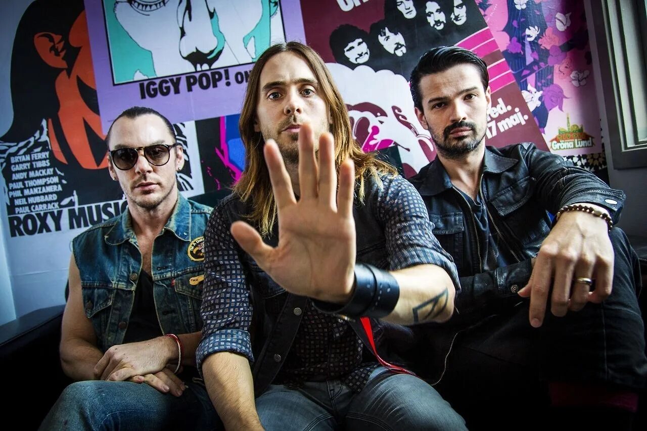 Группа thirty seconds to mars альбомы. Джаред лето 30 seconds to mars. группа джареда лето 30 seconds. группа 30 секунд до марса. группа thirty seconds to mars джаред лето.