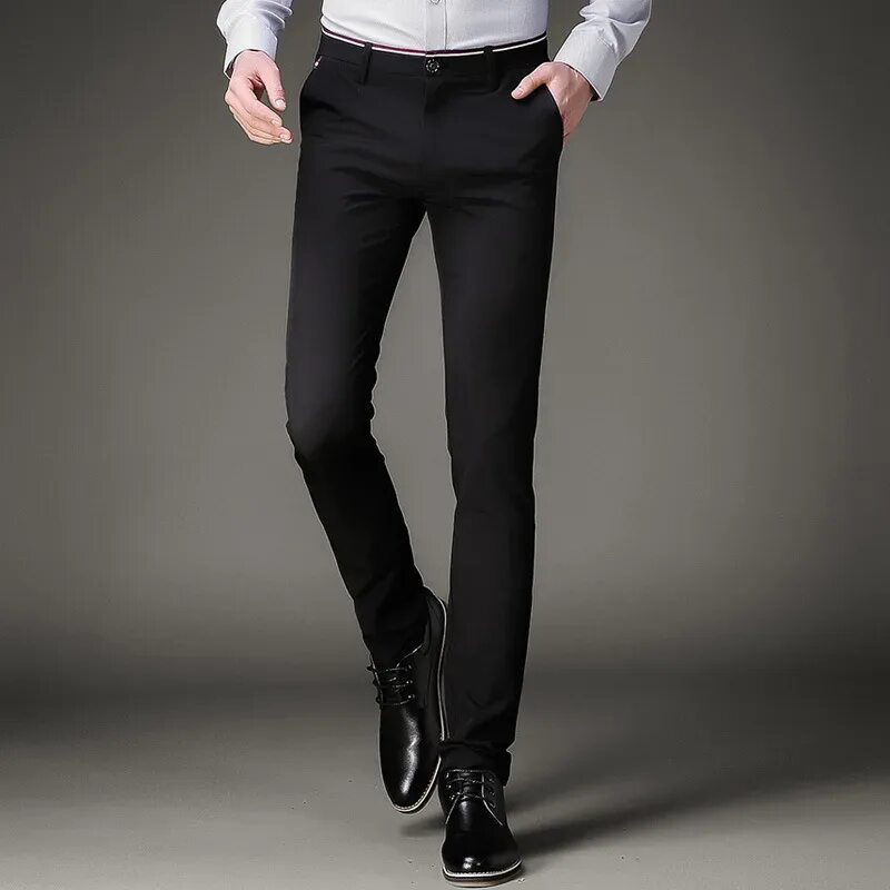 Магазины мужских брюк классических. Брюки слим фит мужские. Чёрные брюки мужские классические. Мужчина в классических брюках. Брюки стрейч мужские.