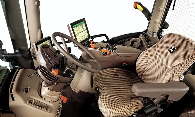 В кабине трактора джон дир 8rx. Кабина john deere 8335r. Управление трактором джон дир. Кабина john deere 8r. John deere 6230r.