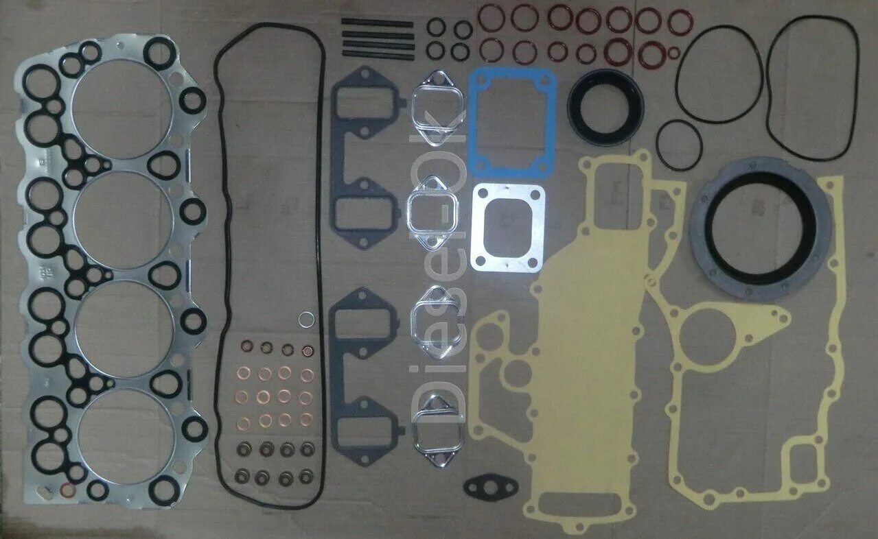набор прокладок для двигателя yanmar. комплект прокладок двигателя izumo 4be1. комплект прокладок митсубиси l200 2. комплект прокладок 37283301. комплект прокладок двигателя 4.