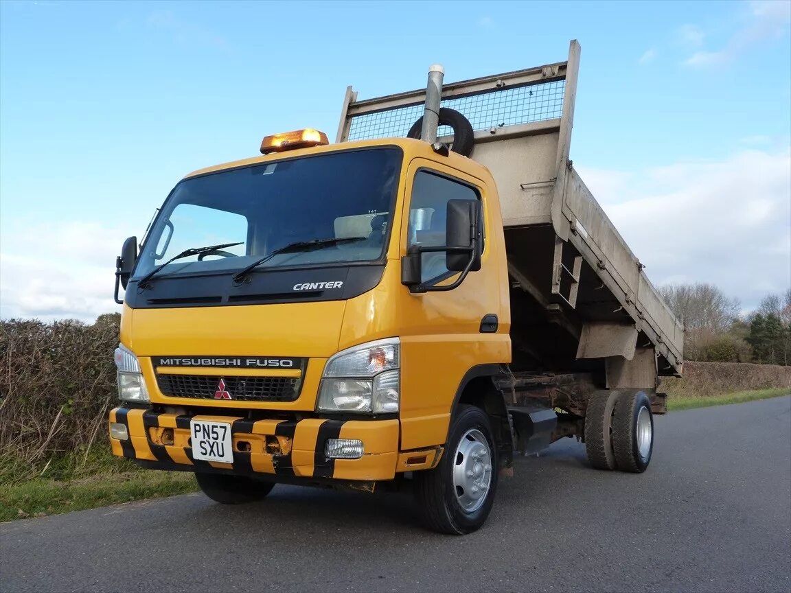 Грузовик митсубиси кантер. Mitsubishi Fuso Canter 4х4. Mitsubishi Canter Fuso 3.5т. Mitsubishi Fuso Canter 4. Mitsubishi Canter бортовой 2-3 тонны.