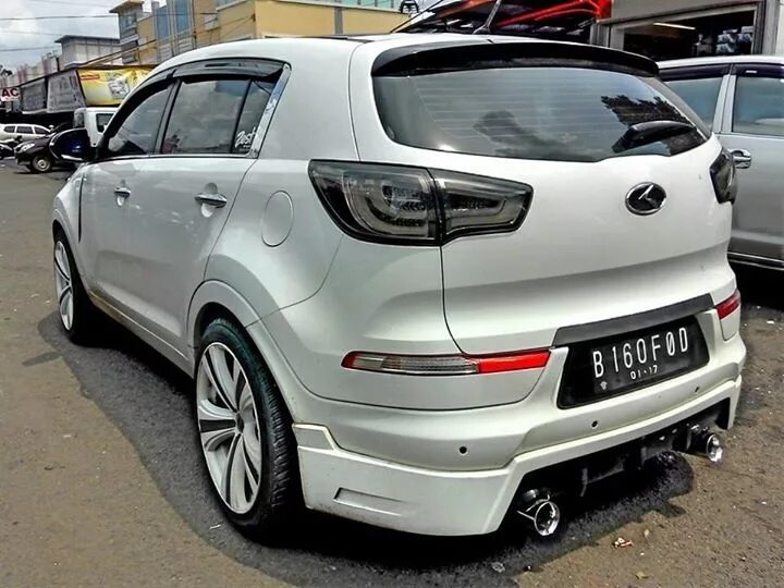 Аксессуара спортейдж. Kia Sportage 3 Tuning. Kia Sportage 2015 Tuning. Kia Sportage 3 обвесы. Обвес на Киа Спортейдж 3.