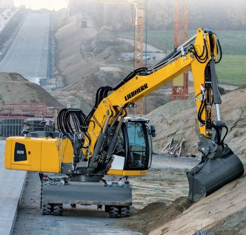 Liebherr a928. Строительная техника колёсные экскаваторы Liebherr a 928 Litronic. Liebherr a 928 Litronic Excavator specs. Колесный экскаватор Liebherr a918.