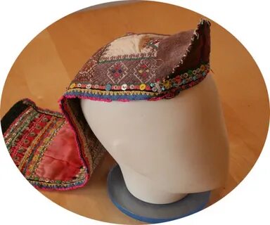 Головной убор марийцев 6 букв на н