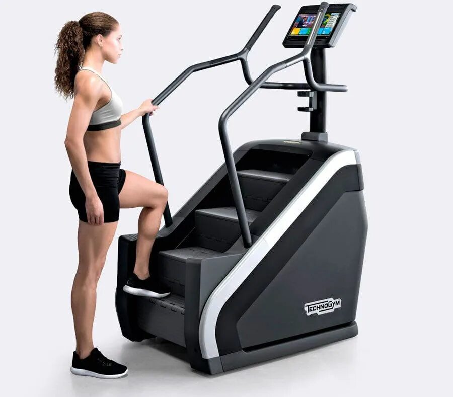 Тренажер лестница какие мышцы работают. Тренажер лестница Техноджим. Technogym тренажеры эллипс. Степпер тренажер Technogym. Кардиотренажер степпер Technogym.