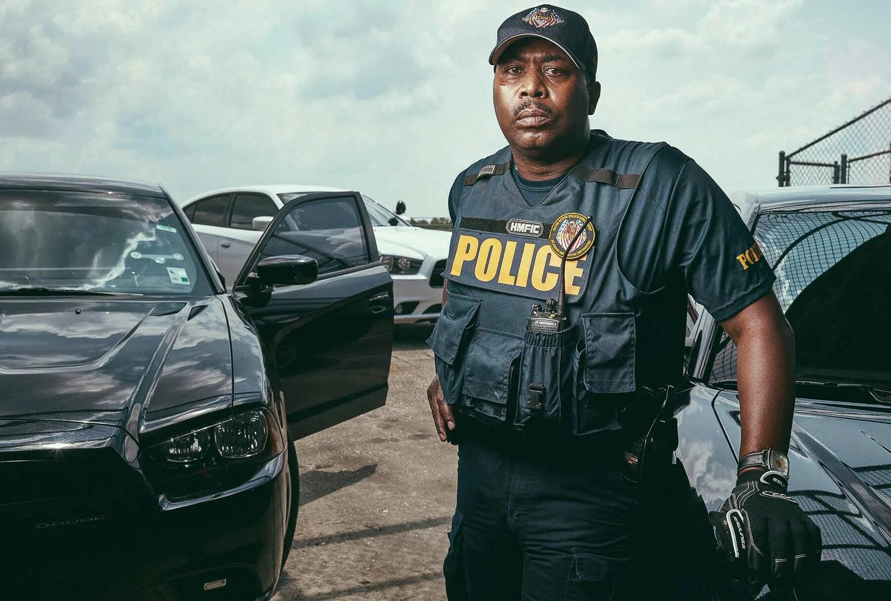 Чернокожий полицейский. Красивые темнокожие полицейские. Черные копы. Афроамериканский полицейский.