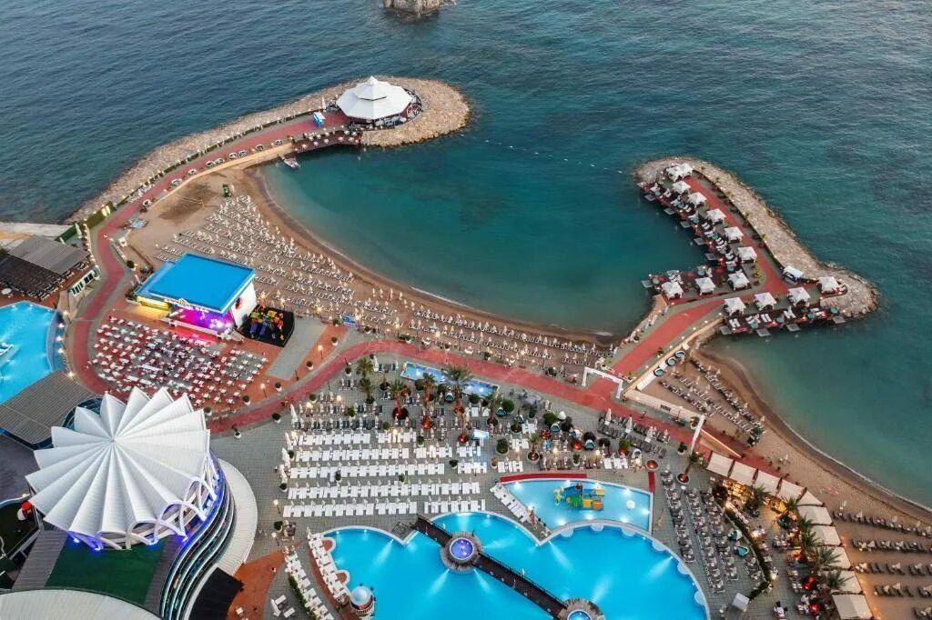 Отель justiniano club park conti 5. Delphin deluxe resort 5 турция алания. Алания поселок окурджалар. Турция отель джустиниано парк конти. Турция аланья okurcalar.