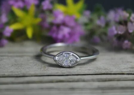 East west marquise engagement ring