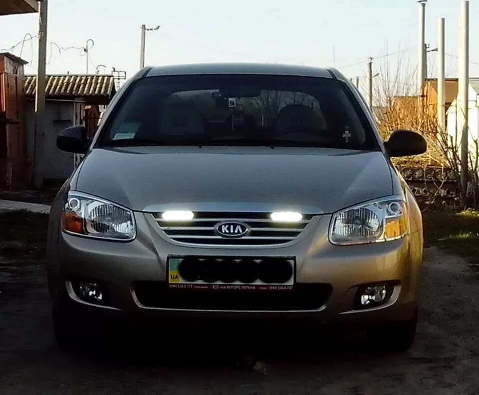 Ходовые огни Киа Церато 2006. ДХО Церато 1. ДХО Kia Cerato 1. Kia Cerato 1 ДХО фары.