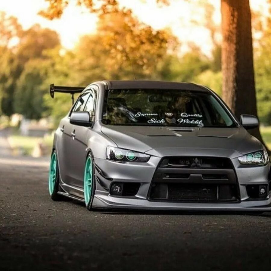 Extra tuning. Mitsubishi EVO 10. Митсубиси Лансер эволю. Mitsubishi Lancer EVO X. Mitsubishi Evolution 10.